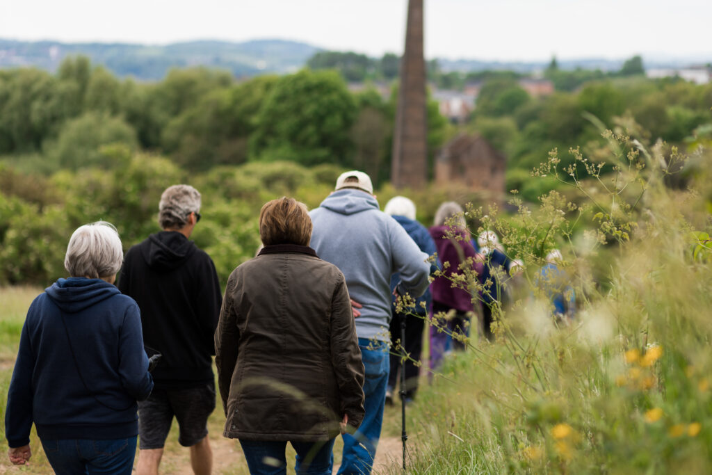 Group of adults walking in Sandwell park